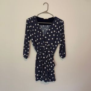 Navy and white polka dot romper